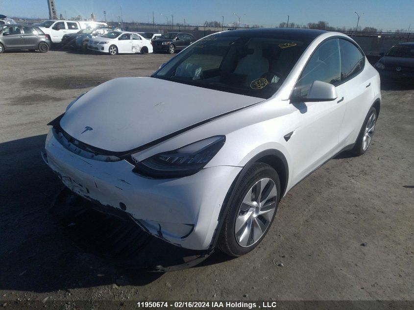 2021 Tesla Model Y VIN: 5YJYGAEE2MF300686 Lot: 11950674