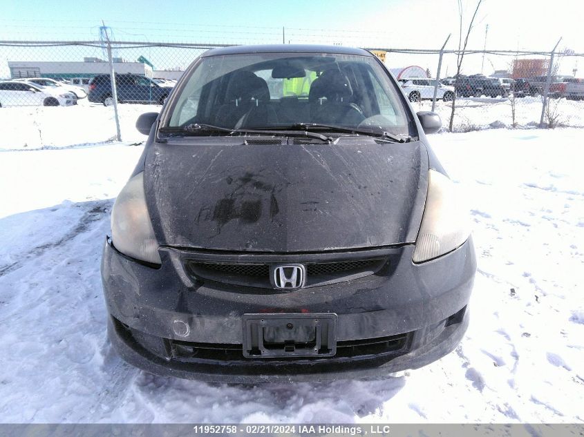 2007 Honda Fit VIN: JHMGD38487S803079 Lot: 11952758