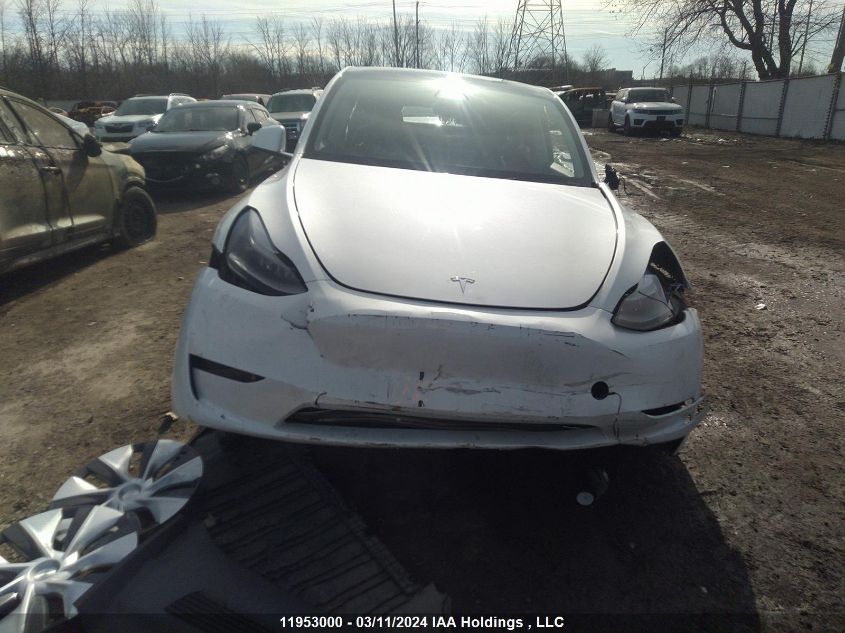 2023 Tesla Model Y VIN: 7SAYGDEE0PF775553 Lot: 11953000
