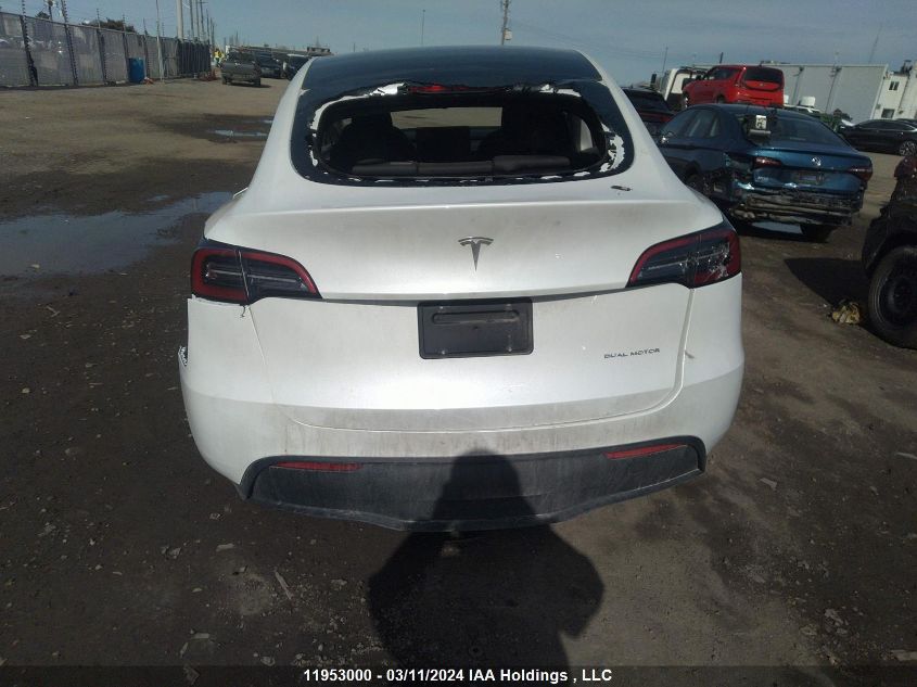 2023 Tesla Model Y VIN: 7SAYGDEE0PF775553 Lot: 11953000