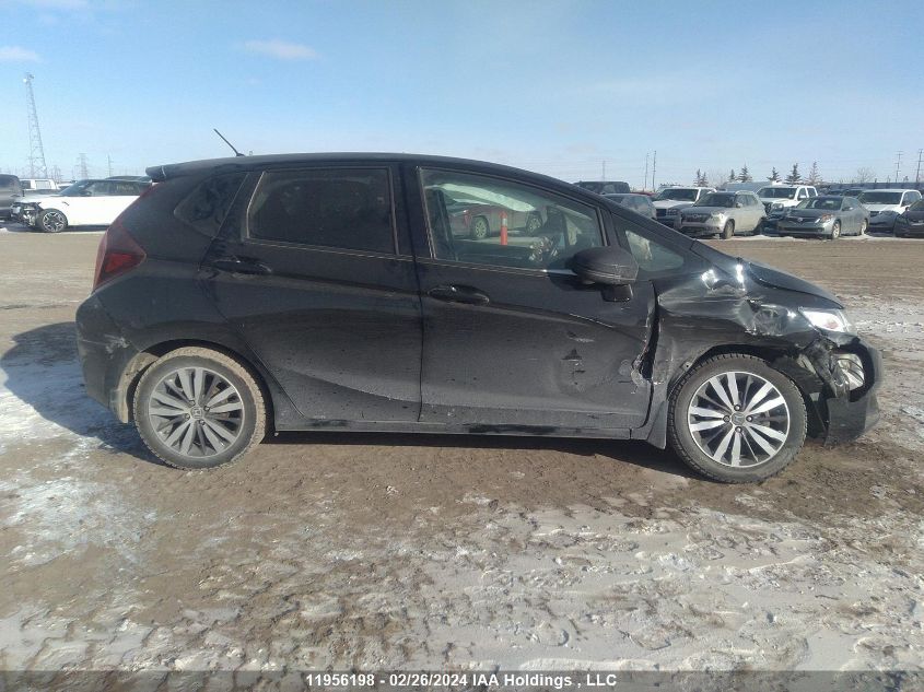 2015 Honda Fit Ex/Exl VIN: 3HGGK5H80FM104009 Lot: 11956198