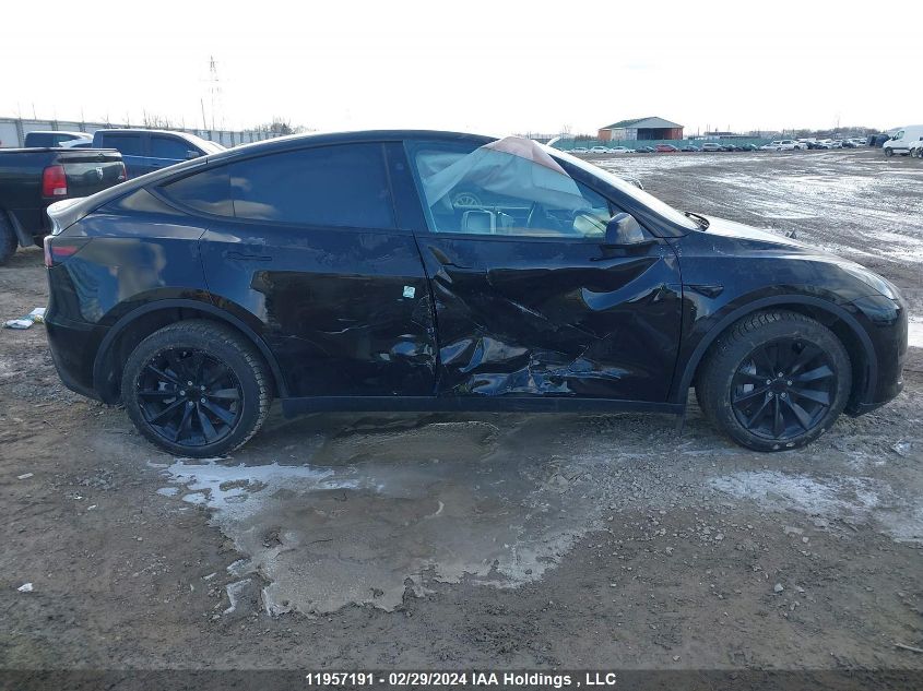 2024 Tesla Model Y VIN: 7SAYGDEE4RF989335 Lot: 11957191