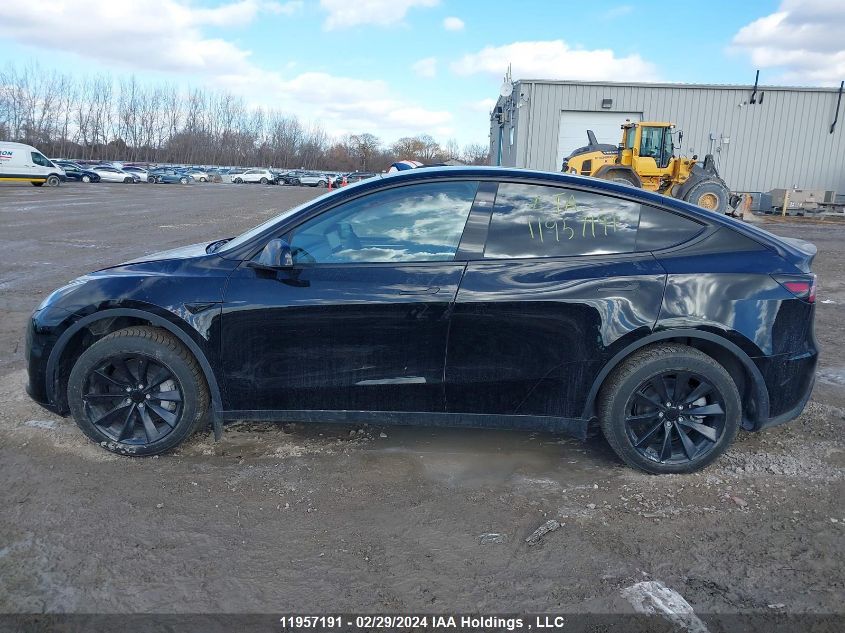 2024 Tesla Model Y VIN: 7SAYGDEE4RF989335 Lot: 11957191