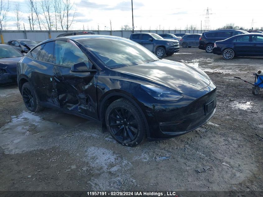 2024 Tesla Model Y VIN: 7SAYGDEE4RF989335 Lot: 11957191