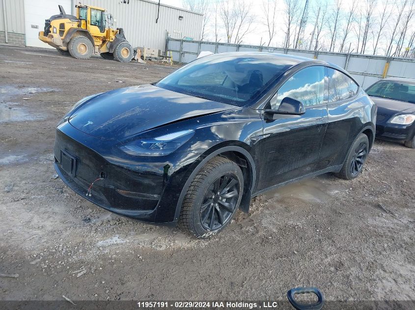 2024 Tesla Model Y VIN: 7SAYGDEE4RF989335 Lot: 11957191