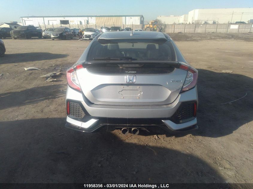 2018 Honda Civic Hatchback VIN: SHHFK7H95JU307228 Lot: 11958356