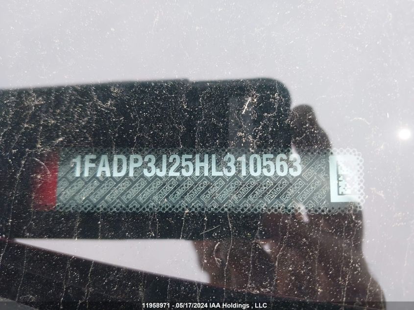 2017 Ford Focus Titanium VIN: 1FADP3J25HL310563 Lot: 11958971