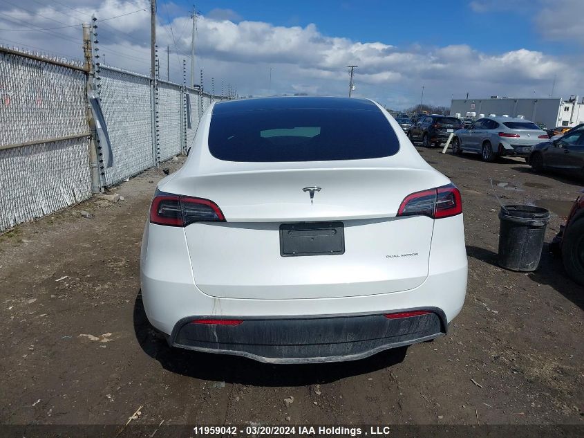 2023 Tesla Model Y VIN: LRWYGDEE3PC107284 Lot: 11959042