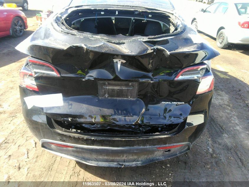 2021 Tesla Model Y VIN: 5YJYGAEE9MF298841 Lot: 11963507