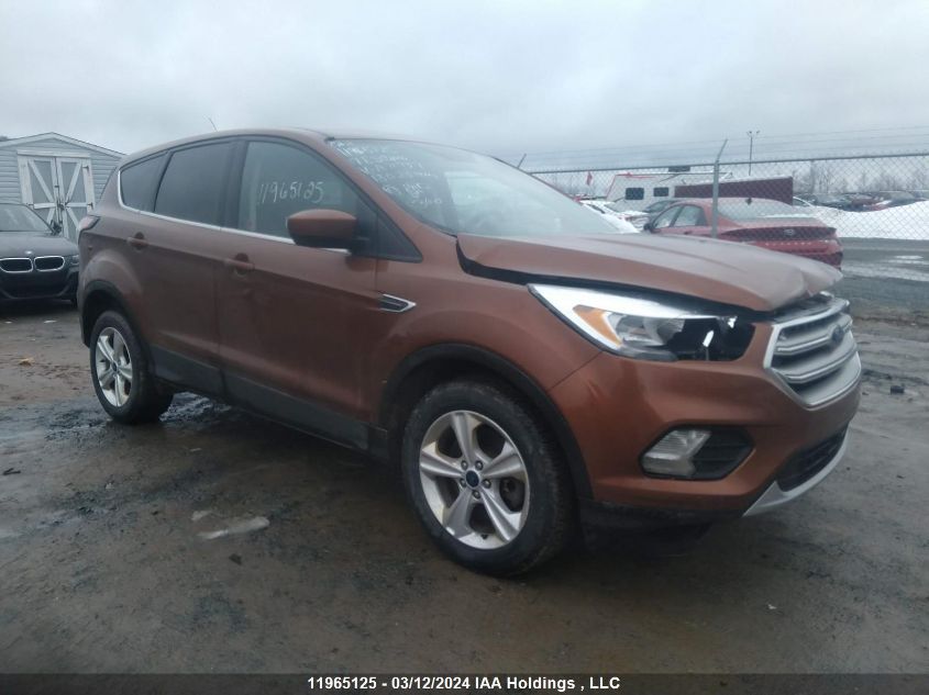 2017 Ford Escape Se VIN: 1FMCU9GDXHUA71737 Lot: 11965125