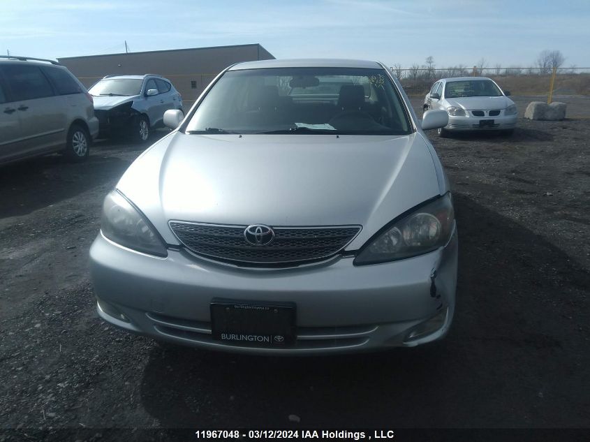 2003 Toyota Camry Le/Xle VIN: JTDBE32KX30192848 Lot: 11967048