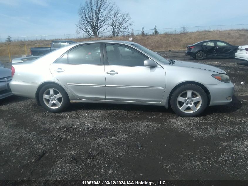 2003 Toyota Camry Le/Xle VIN: JTDBE32KX30192848 Lot: 11967048