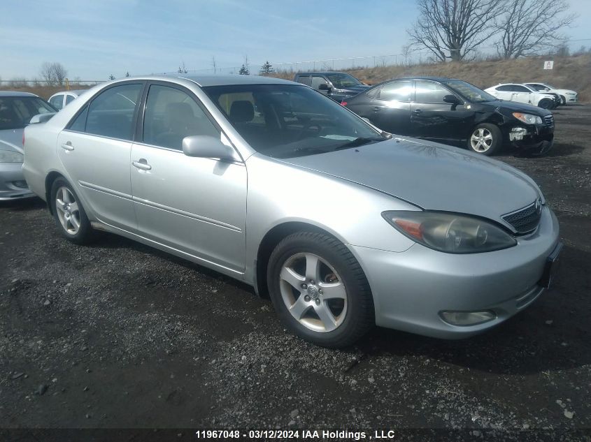 2003 Toyota Camry Le/Xle VIN: JTDBE32KX30192848 Lot: 11967048