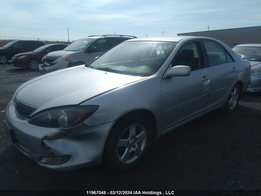 2003 Toyota Camry Le/Xle VIN: JTDBE32KX30192848 Lot: 11967048