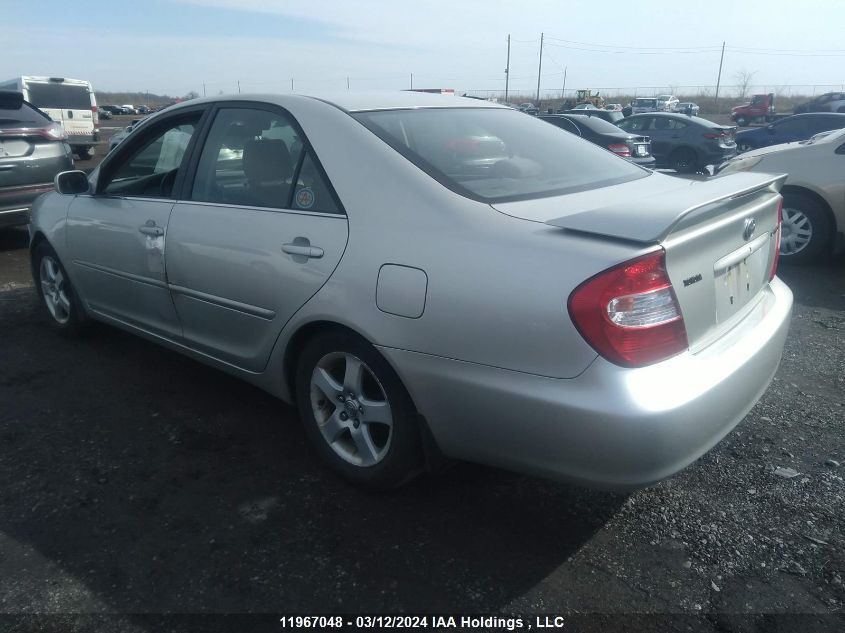 2003 Toyota Camry Le/Xle VIN: JTDBE32KX30192848 Lot: 11967048