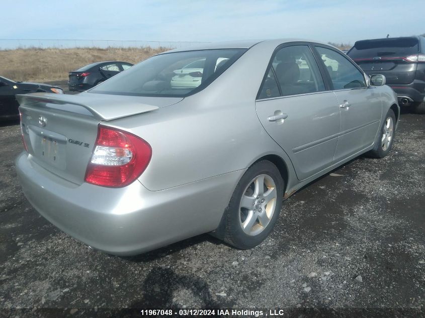 2003 Toyota Camry Le/Xle VIN: JTDBE32KX30192848 Lot: 11967048