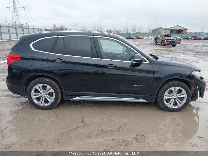 2018 BMW X1 VIN: WBXHT3C33J5F90643 Lot: 42298354