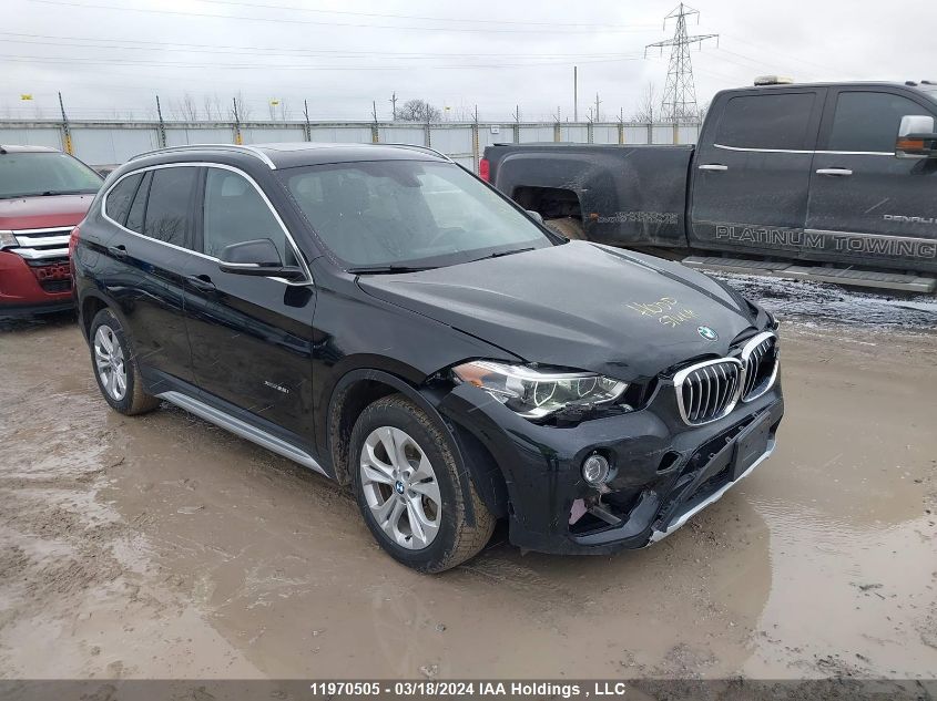 2018 BMW X1 VIN: WBXHT3C33J5F90643 Lot: 42298354