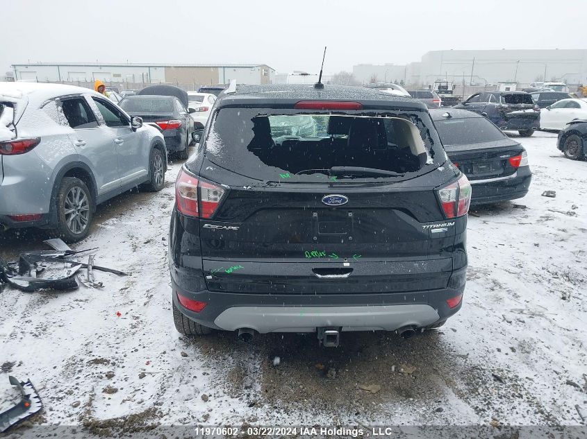 2017 Ford Escape Titanium VIN: 1FMCU9J96HUE40422 Lot: 11970602