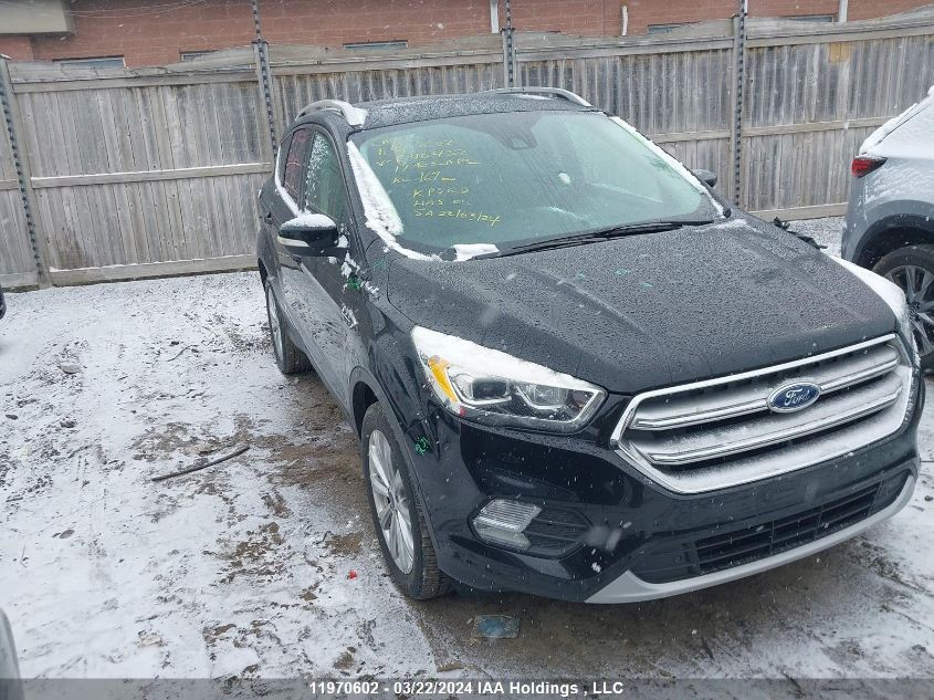 2017 Ford Escape Titanium VIN: 1FMCU9J96HUE40422 Lot: 11970602