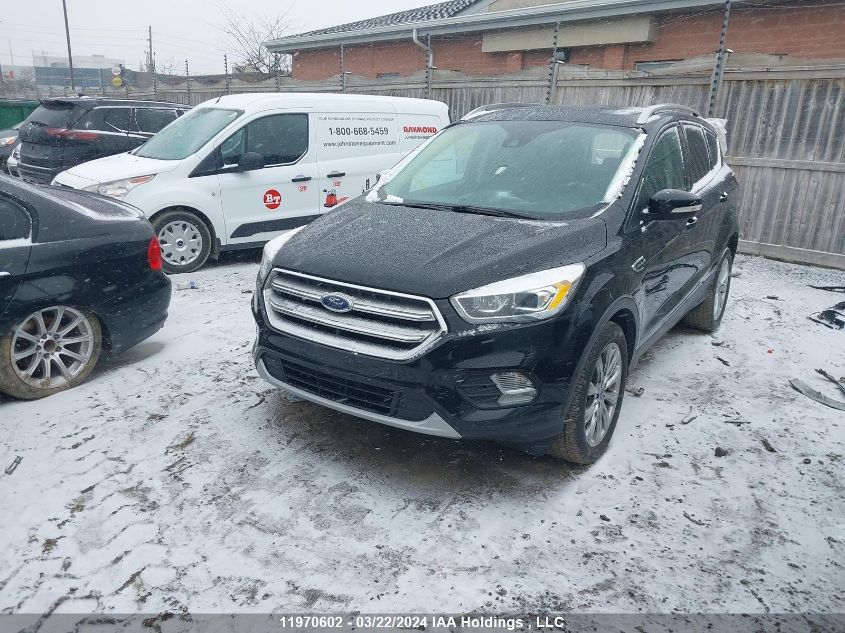 2017 Ford Escape Titanium VIN: 1FMCU9J96HUE40422 Lot: 11970602