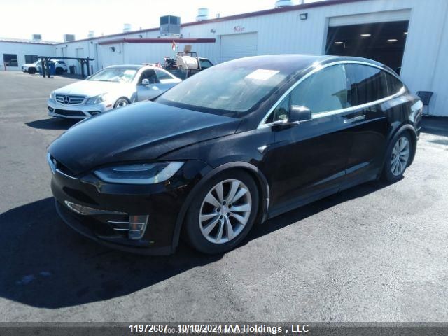 2018 Tesla Model X VIN: 5YJXCDE22JF124104 Lot: 11972687