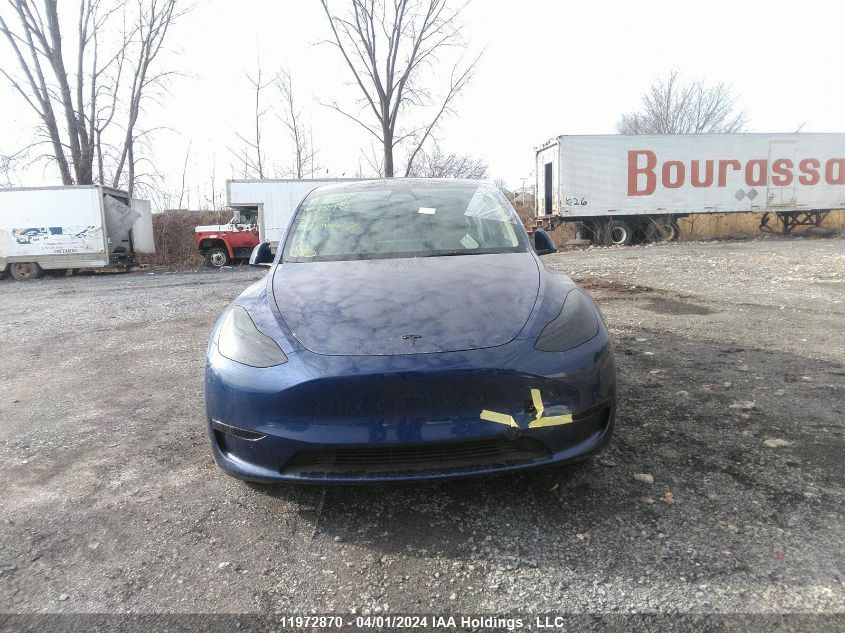 2023 Tesla Model Y VIN: LRWYGDFD0PC163592 Lot: 11972870