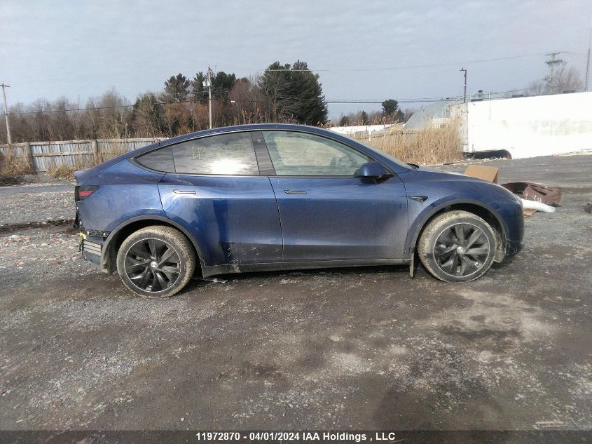 2023 Tesla Model Y VIN: LRWYGDFD0PC163592 Lot: 11972870