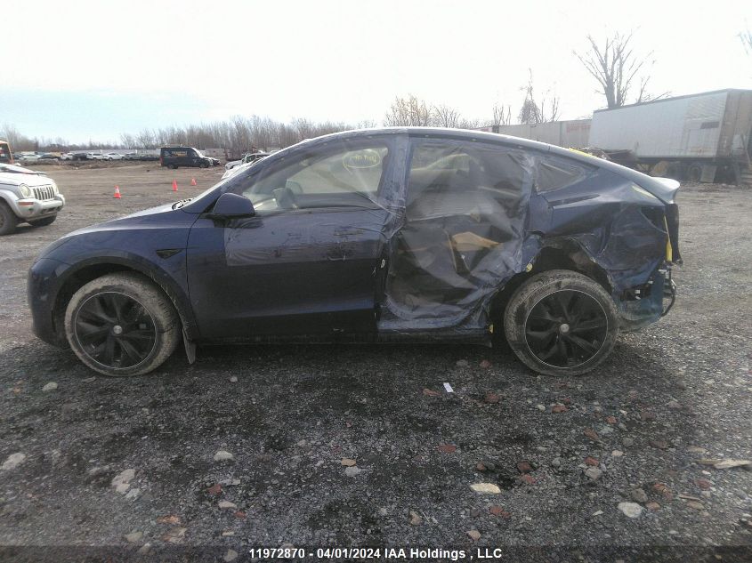 2023 Tesla Model Y VIN: LRWYGDFD0PC163592 Lot: 11972870