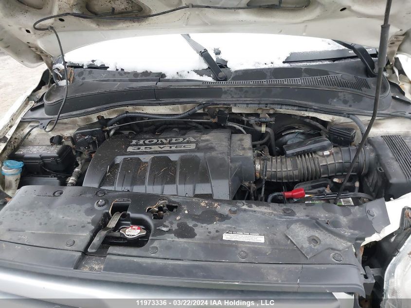 2007 Honda Pilot VIN: 2HKYF18577H000193 Lot: 11973336