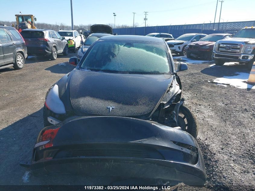 2021 Tesla Model 3 VIN: 5YJ3E1EA3MF090712 Lot: 11973382