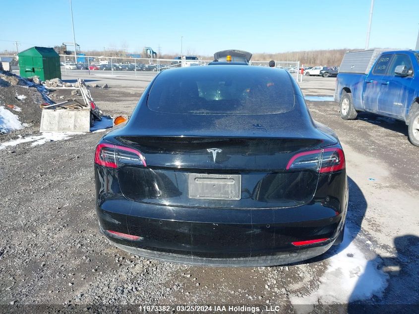 2021 Tesla Model 3 VIN: 5YJ3E1EA3MF090712 Lot: 11973382