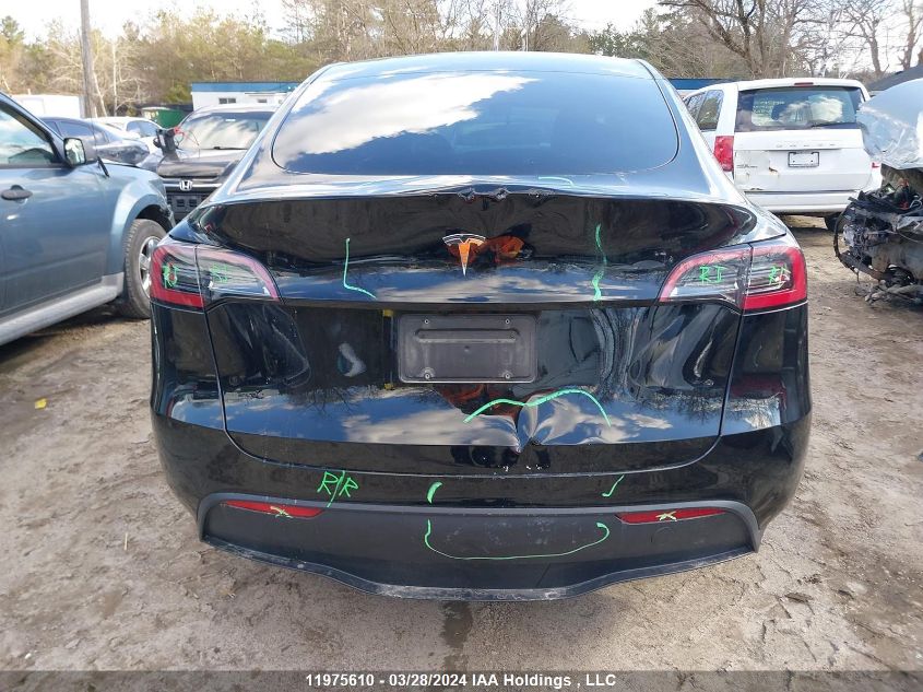 2023 Tesla Model Y VIN: LRWYGDFD7PC967713 Lot: 11975610