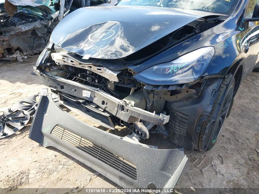 2023 Tesla Model Y VIN: LRWYGDFD7PC967713 Lot: 11975610