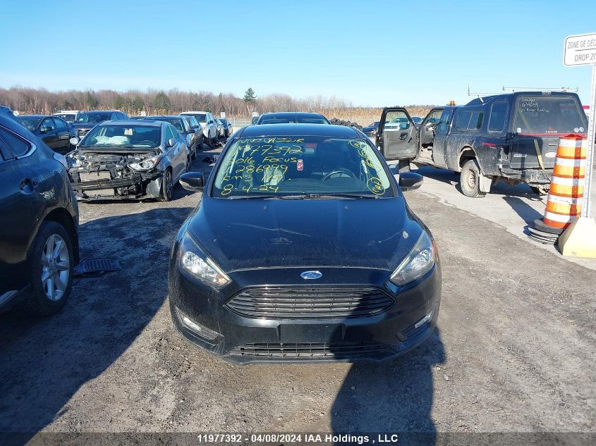 2016 Ford Focus VIN: 1FADP3K21GL286999 Lot: 11977392