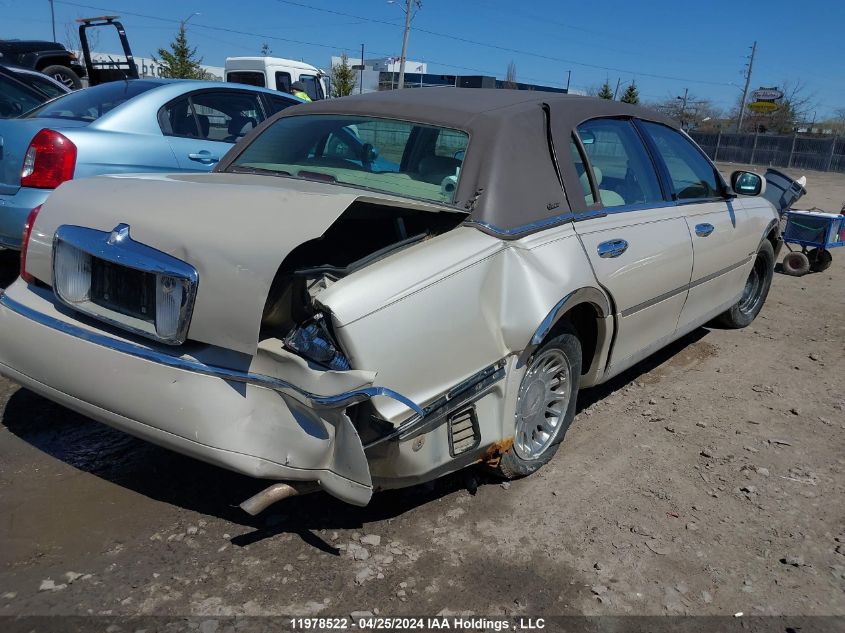 2002 Lincoln Town Car VIN: 1LNHM83WX2Y611028 Lot: 11978522