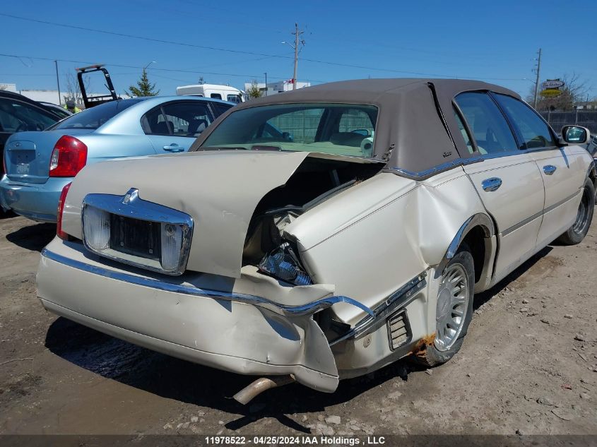 2002 Lincoln Town Car VIN: 1LNHM83WX2Y611028 Lot: 11978522