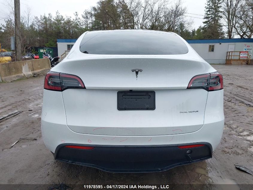 2023 Tesla Model Y VIN: LRWYGDEE1PC162588 Lot: 11978595