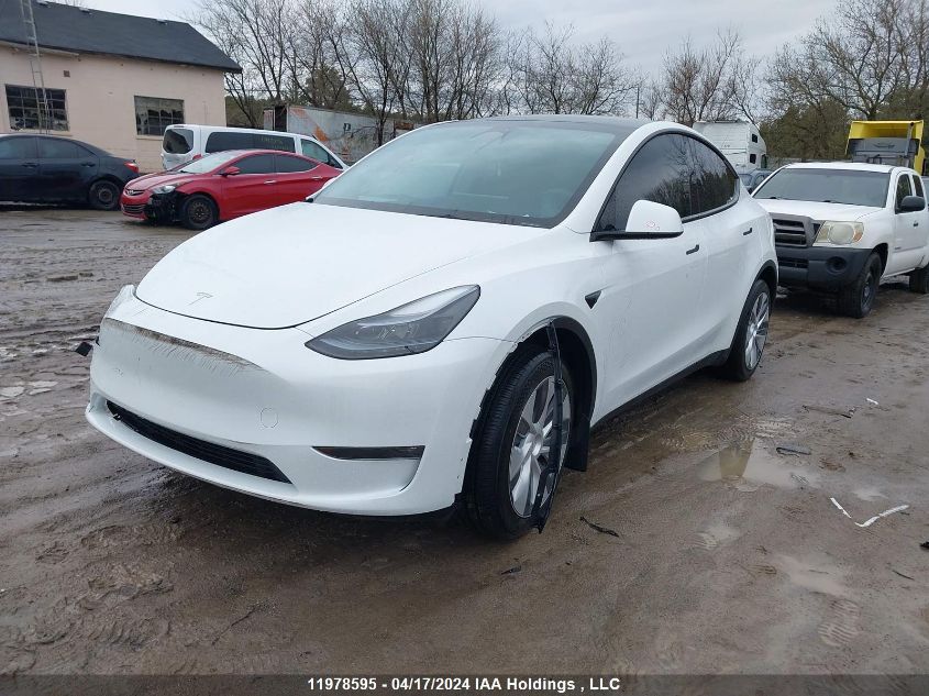 2023 Tesla Model Y VIN: LRWYGDEE1PC162588 Lot: 11978595