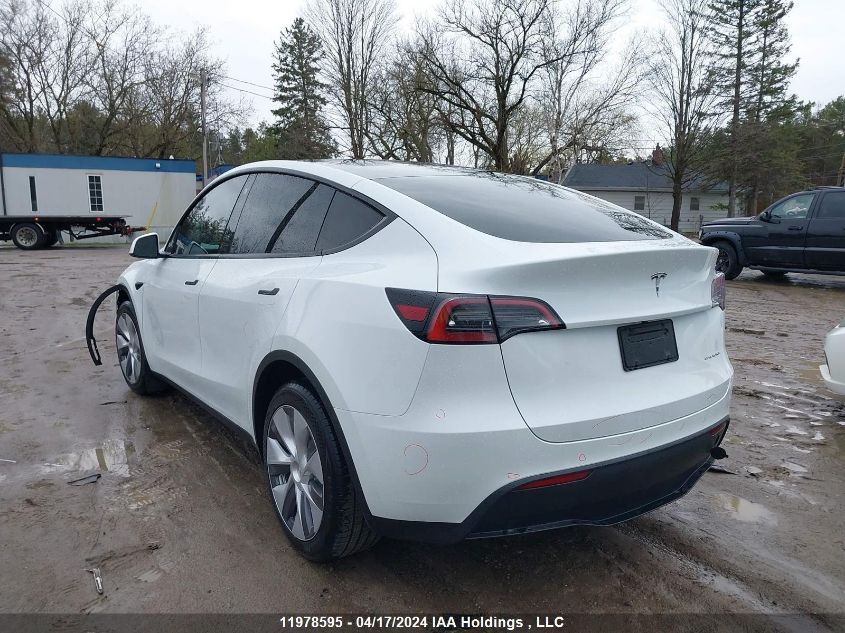 2023 Tesla Model Y VIN: LRWYGDEE1PC162588 Lot: 11978595