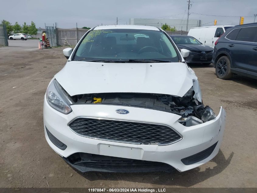 2016 Ford Focus VIN: 1FADP3F21GL316397 Lot: 11978847