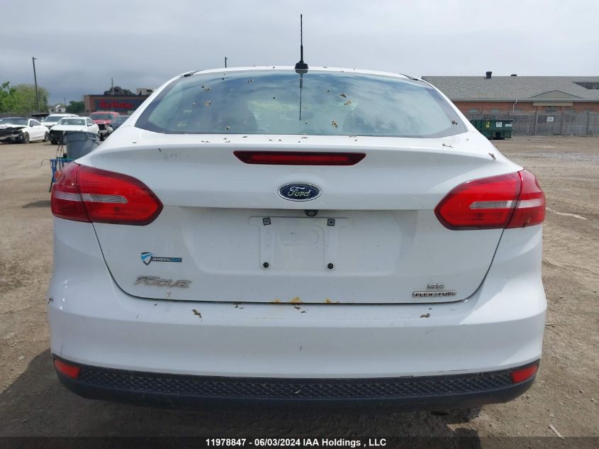 2016 Ford Focus VIN: 1FADP3F21GL316397 Lot: 11978847