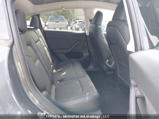 2023 Tesla Model Y VIN: LRWYGDFD8PC222100 Lot: 11979478