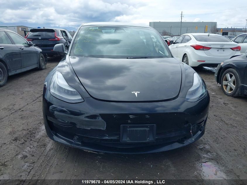 2022 Tesla Model 3 VIN: 5YJ3E1EB5NF231998 Lot: 11979670