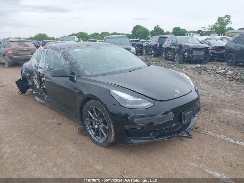 2022 Tesla Model 3 VIN: 5YJ3E1EB5NF231998 Lot: 11979670