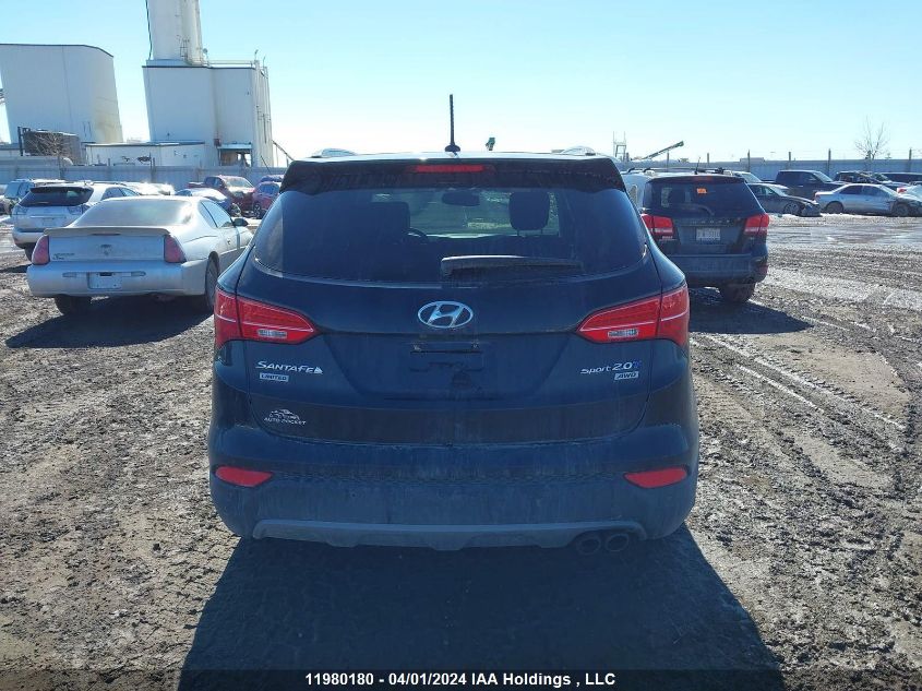 2015 Hyundai Santa Fe Sport 2.0T Limited VIN: 5XYZUDLA0FG282098 Lot: 11980180