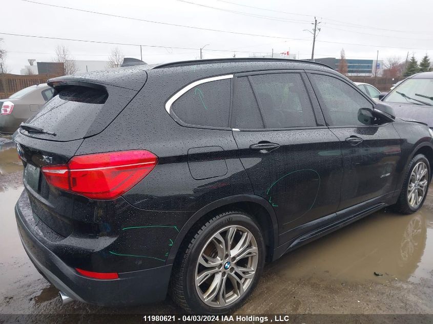 2018 BMW X1 VIN: WBXHT3C32J5F92013 Lot: 11980621