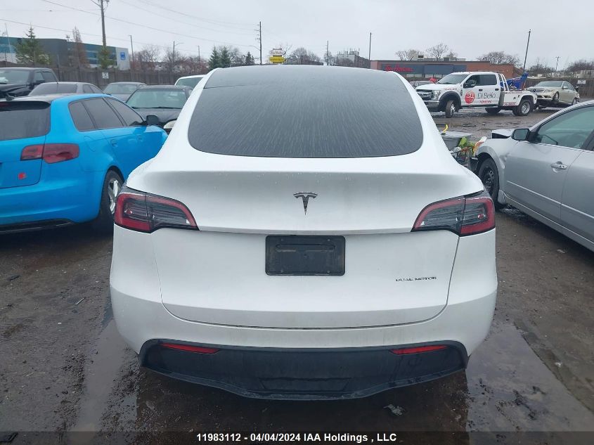 2023 Tesla Model Y VIN: 7SAYGDEE3PF591921 Lot: 11983112