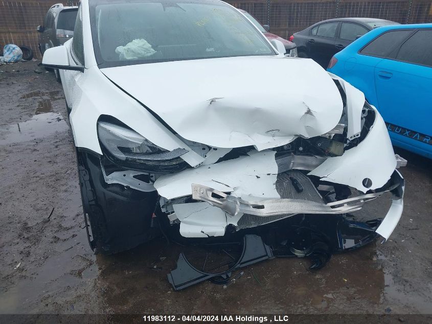 2023 Tesla Model Y VIN: 7SAYGDEE3PF591921 Lot: 11983112