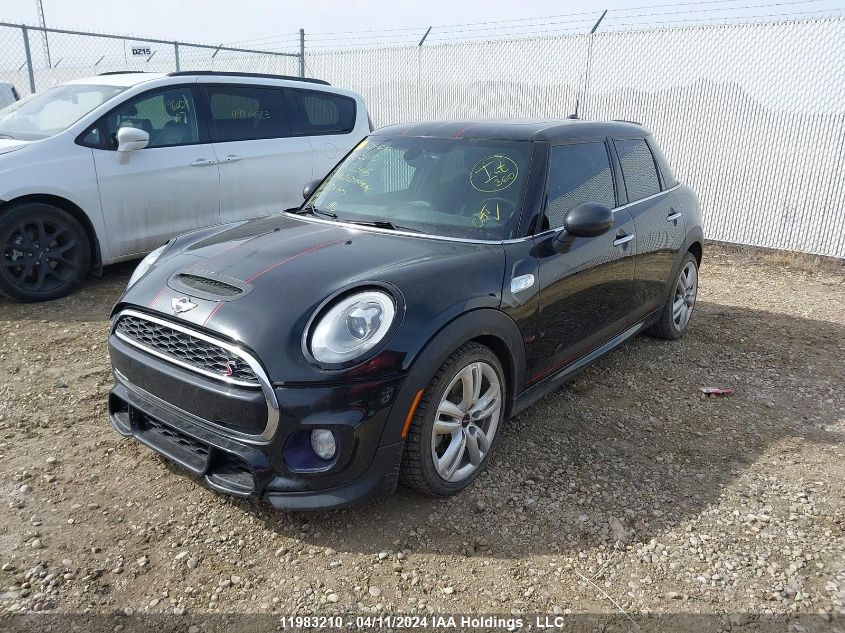 2017 Mini Cooper Hardtop 5 Door VIN: WMWXU3C57H2D32366 Lot: 39227509